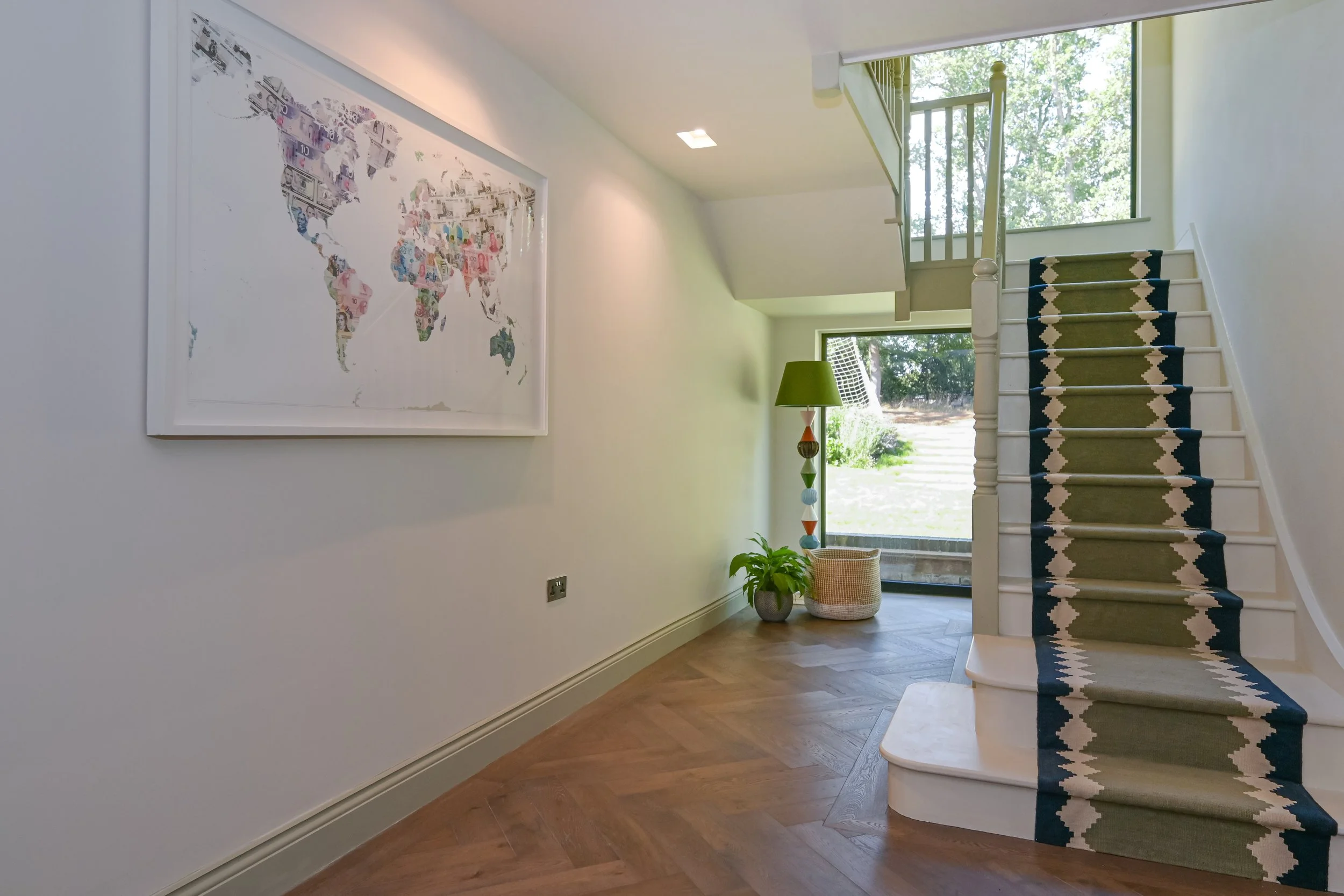 Large static panels flood the hallway with light