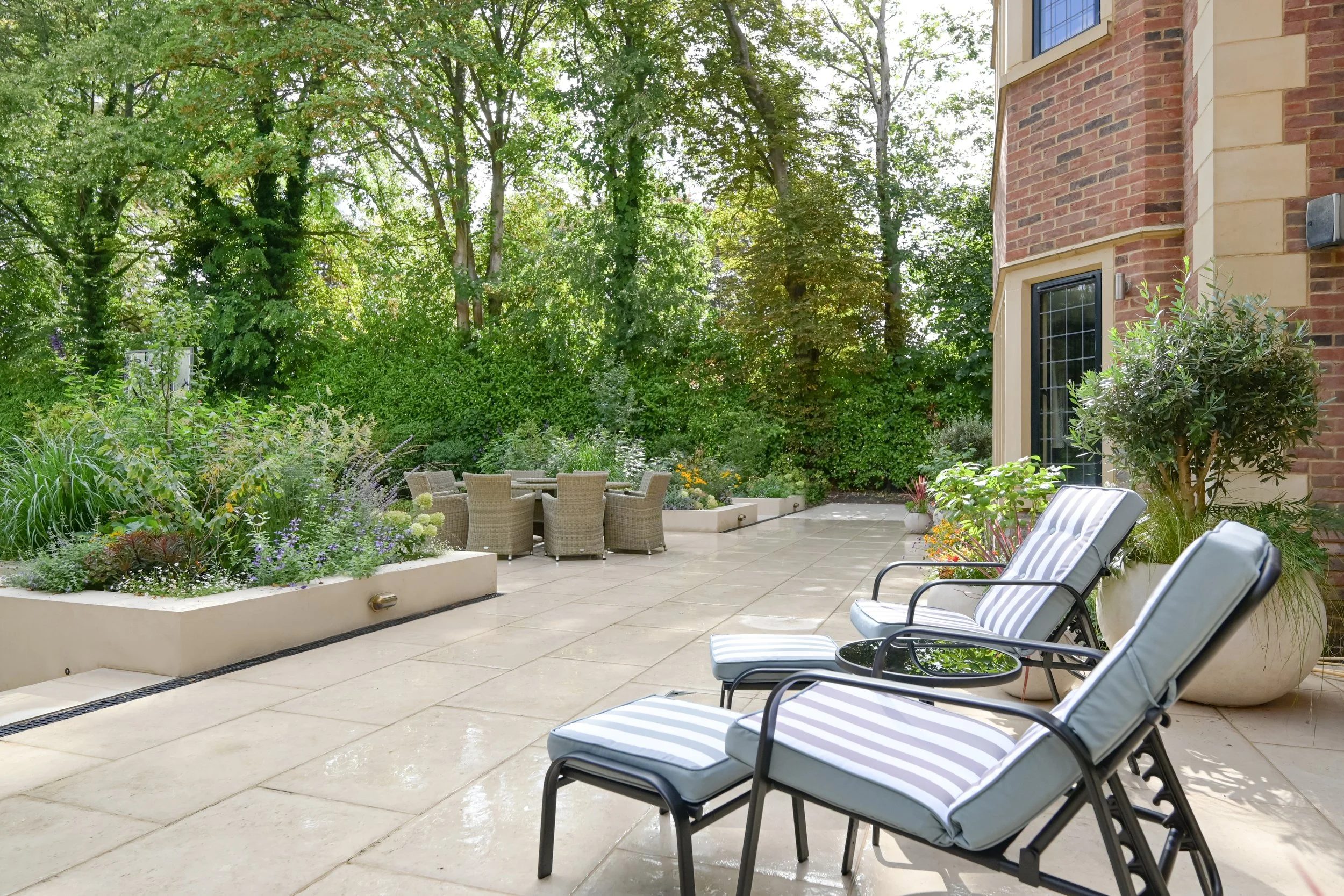 Flowers and scents now surround the outdoor dining area