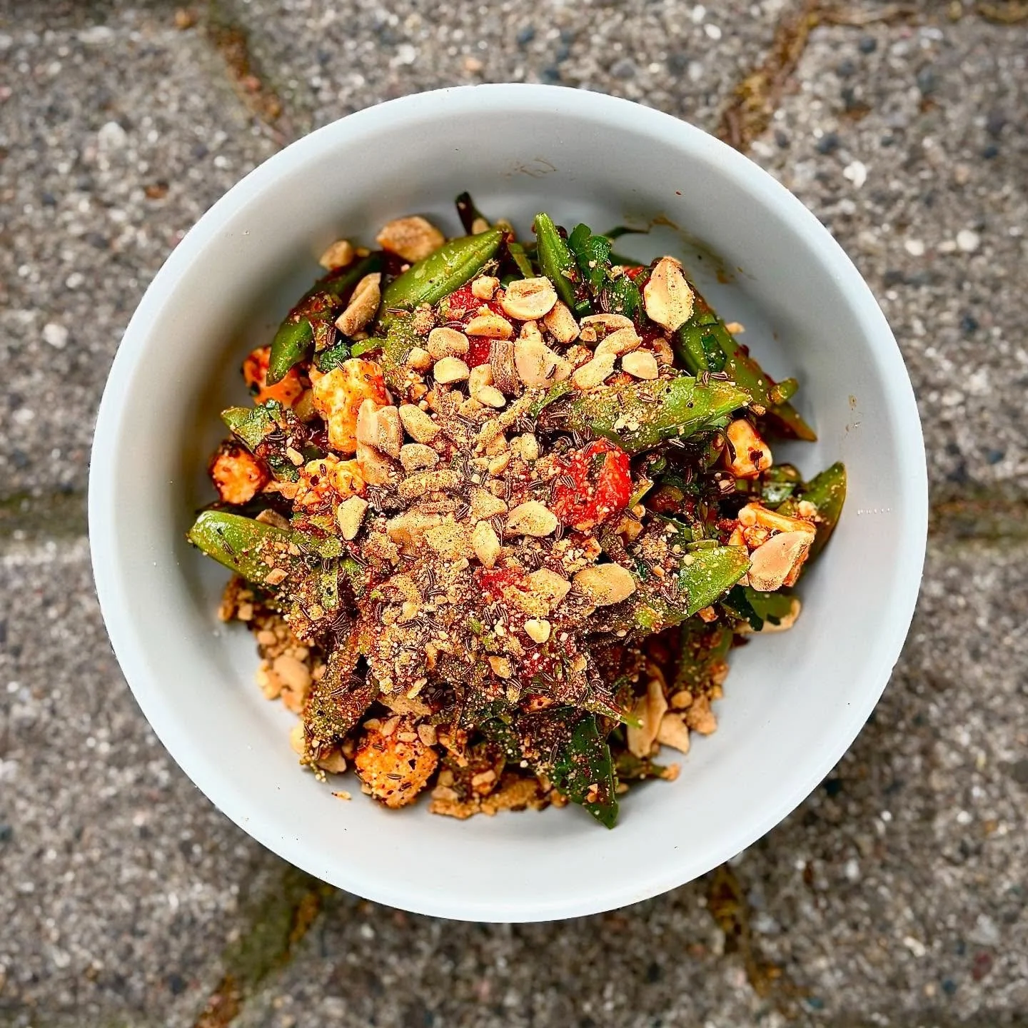 SNAP PEAS! Now on the menu with @hio_farm  strawberries, culantro, basil, fish sauce, tamarind, harissa, Bulgarian feta and peanut crunch.