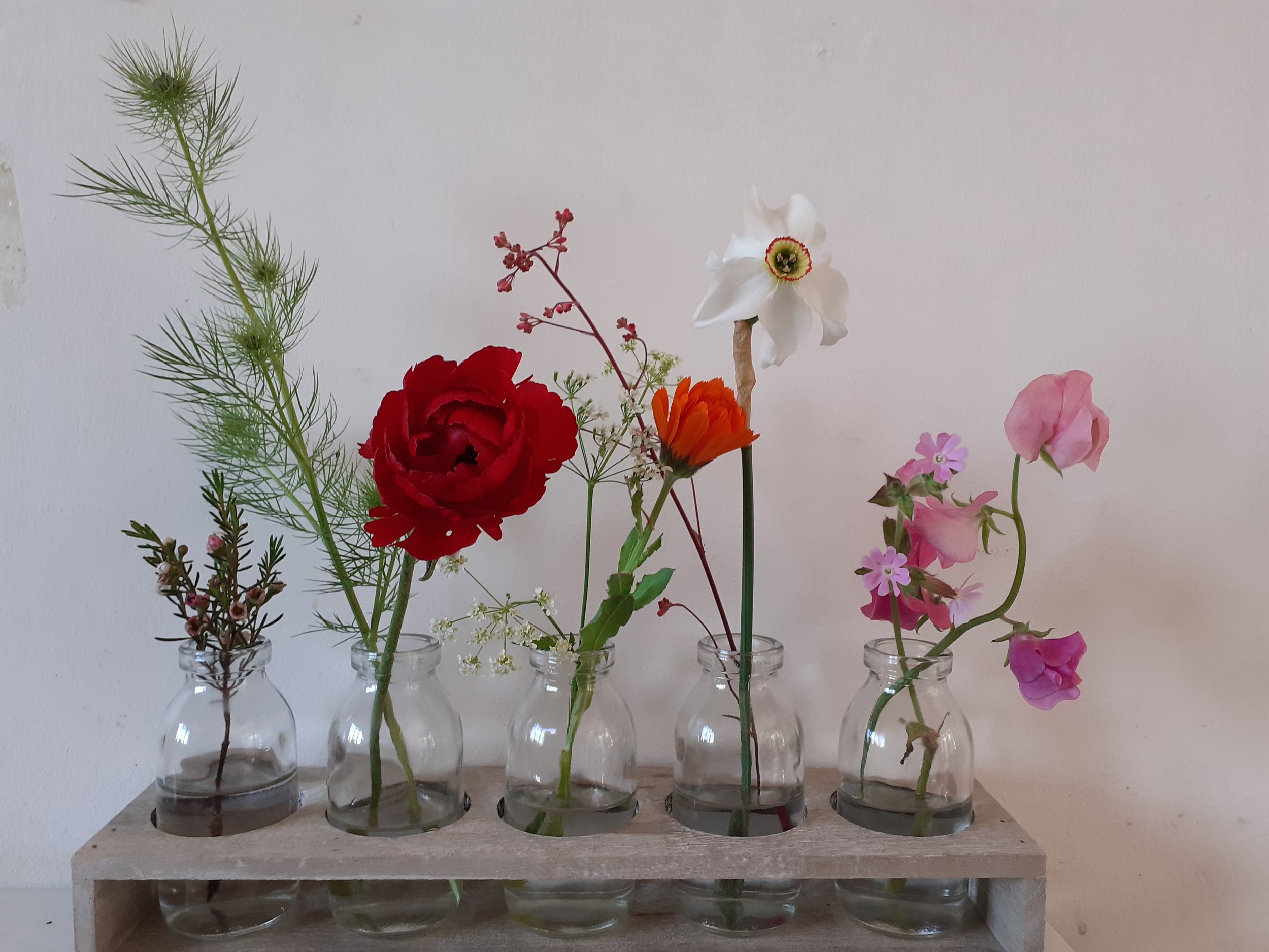 Glass vial floral display from Meadowsweet Floristry based in Stroud, Gloucestershire