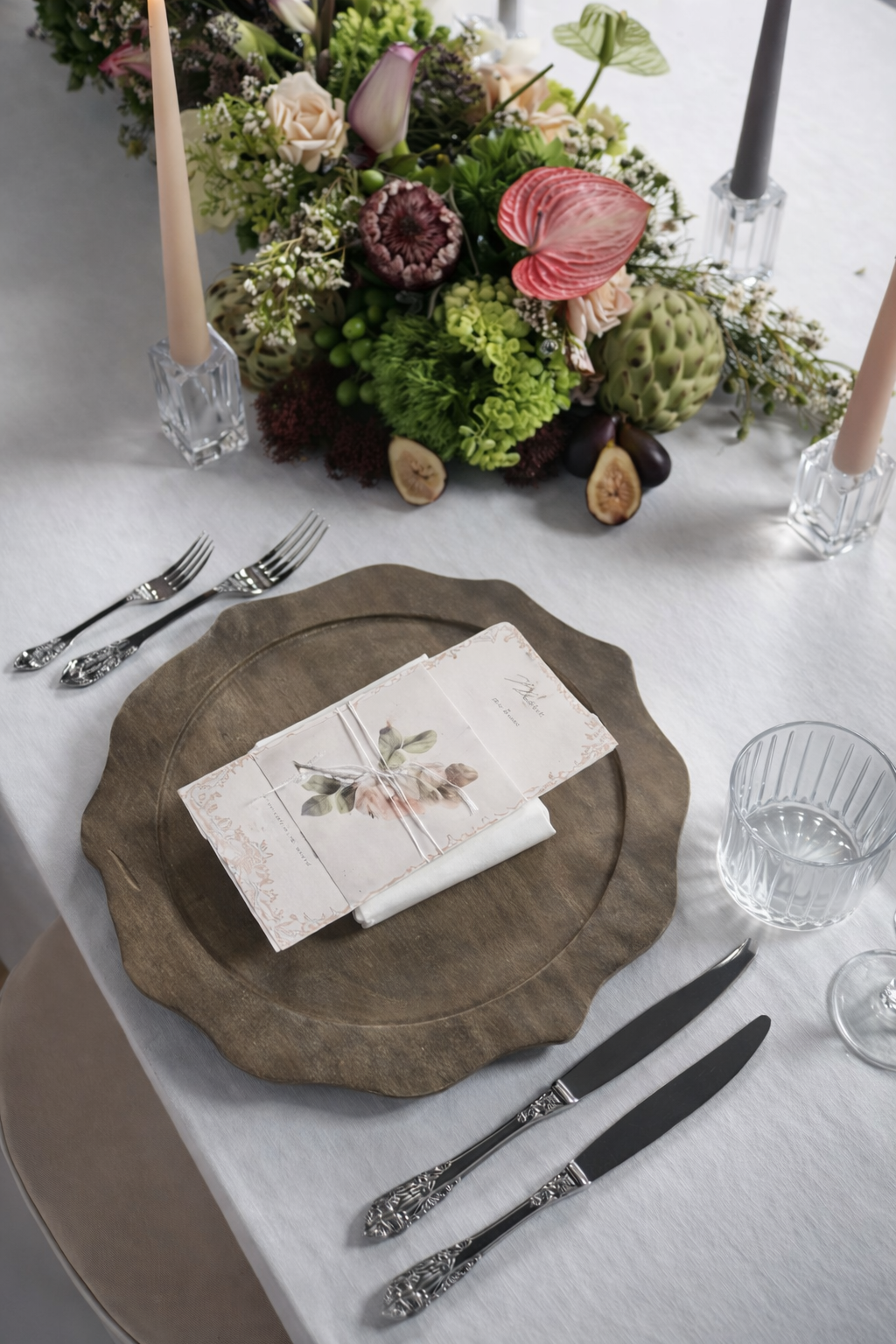 A rustic wooden charger plate with a scalloped edge, perfect for layered, organic, and elevated tabletop designs. | Wooden Charger Plate Renal Kamloops, Kelowna, Okanagan