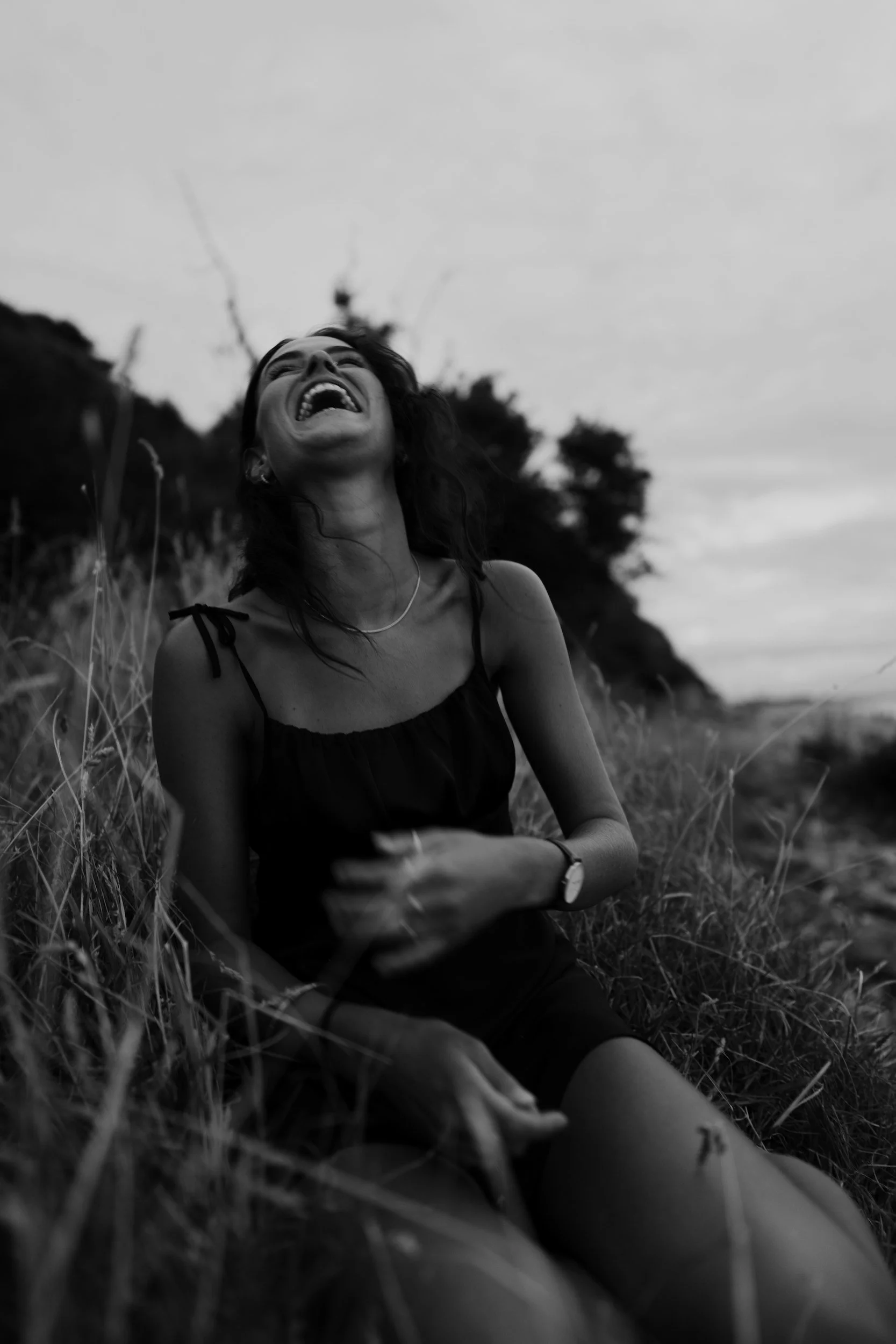 A women that is happy and laughing. If you are experiencing stress from childhood trauma then reaching out to an EMDR intensive therapist can help. Learn more about EMDR intensives in Columbus, Ohio today and begin to smile again.