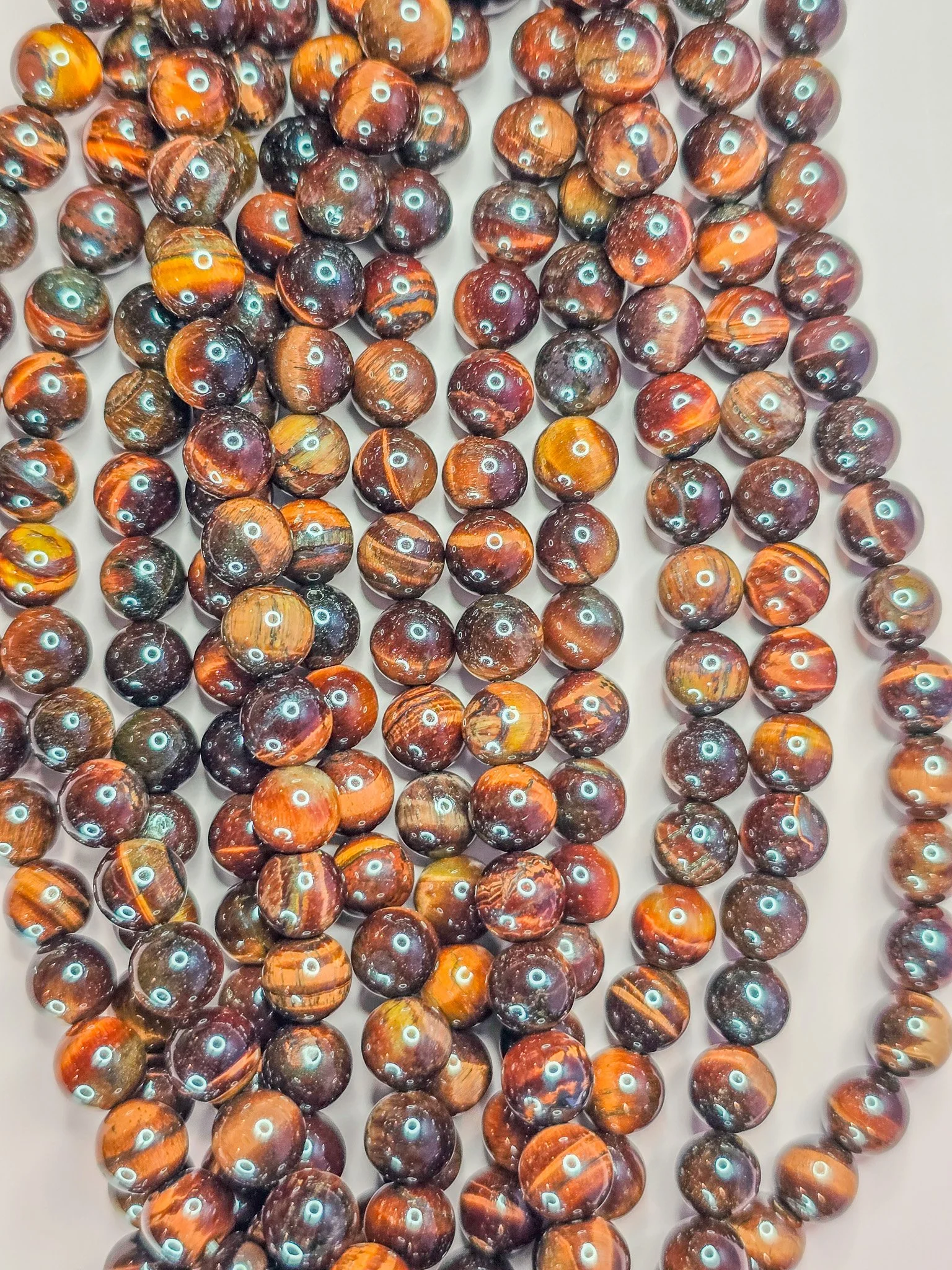 8 millimeter red tiger's eye round beads (heated)
