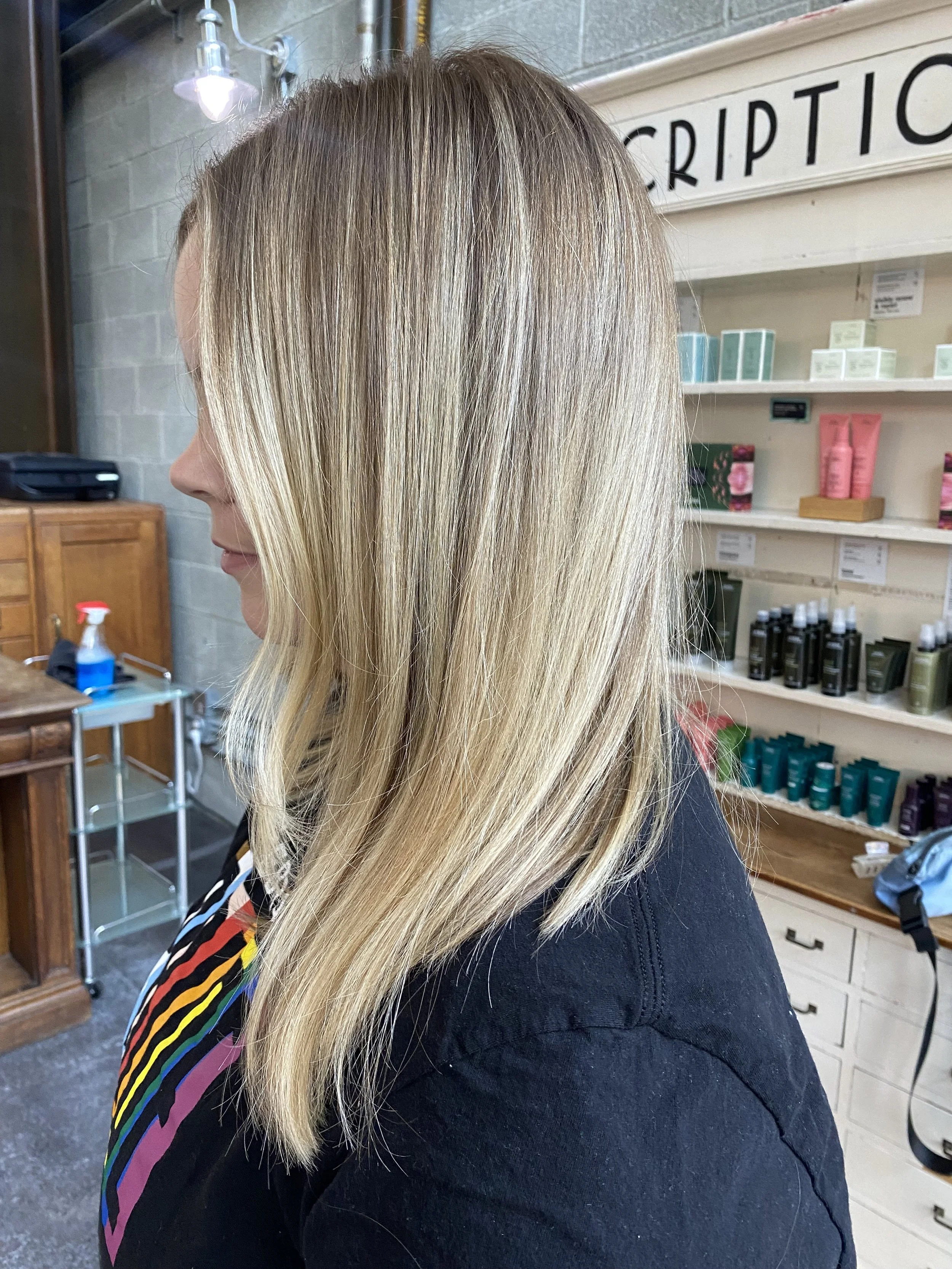 This is a beautiful low-maintenance blonde that was fully customized for Charlie's client. She absolutely LOVED the final result!