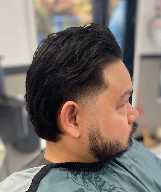 This skin-fade brushback is a perfect example of the highly precise barbering skills that Zak brings to the team at Lady Neptune.