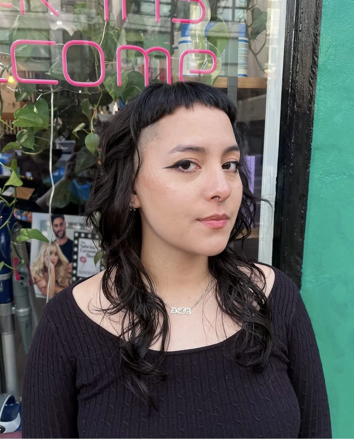 Wavy shag mullet with micro bangs and a shaved side, styled to air-dry, one of Meg’s haircuts in the University District at Lady Neptune