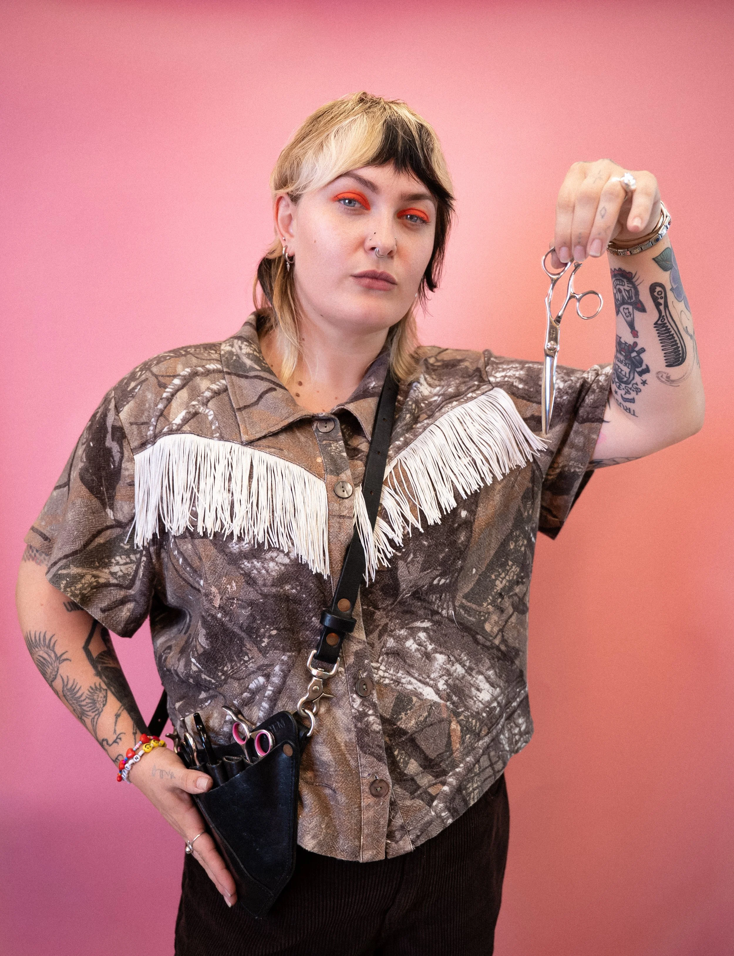 Alex is one of the best hairstylists in Seattle and specializes in razor-cutting, vivid colors, and gender-affirming haircuts. If you're looking for a creative cut that makes you feel more like yourself, Alex is the one to book with at Lady Neptune!