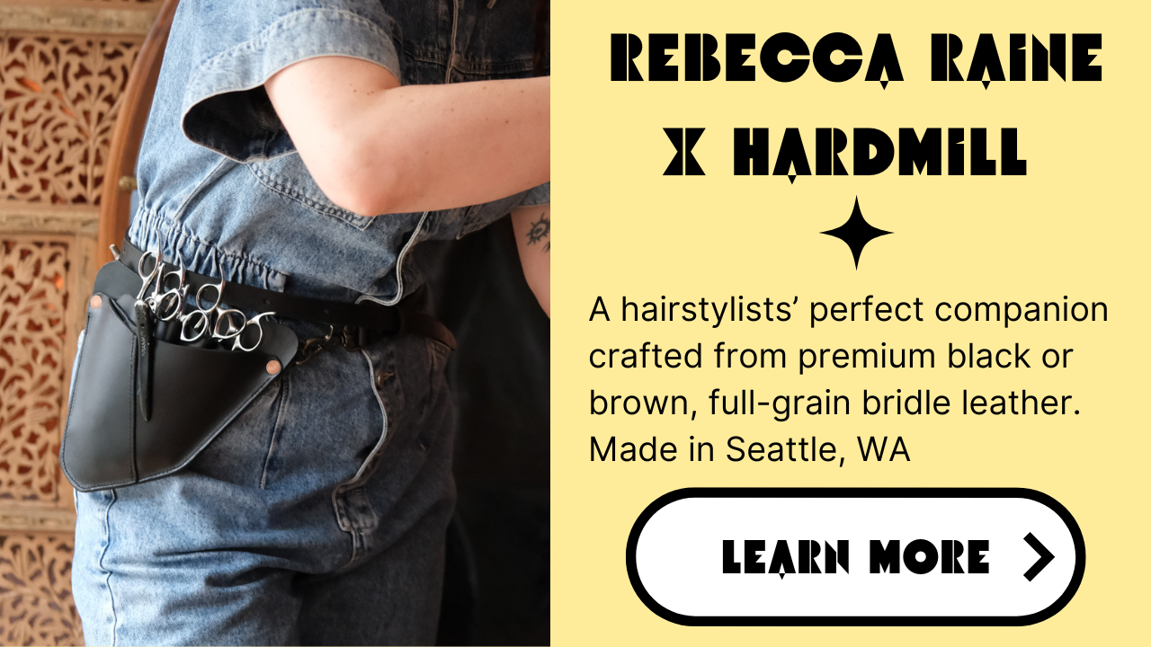 This picture shows a black, leather shear holster created as a collaboration between Rebecca Raine and Hardmill leather company. This holster acts as the perfect companion for all of your haircutting tools.