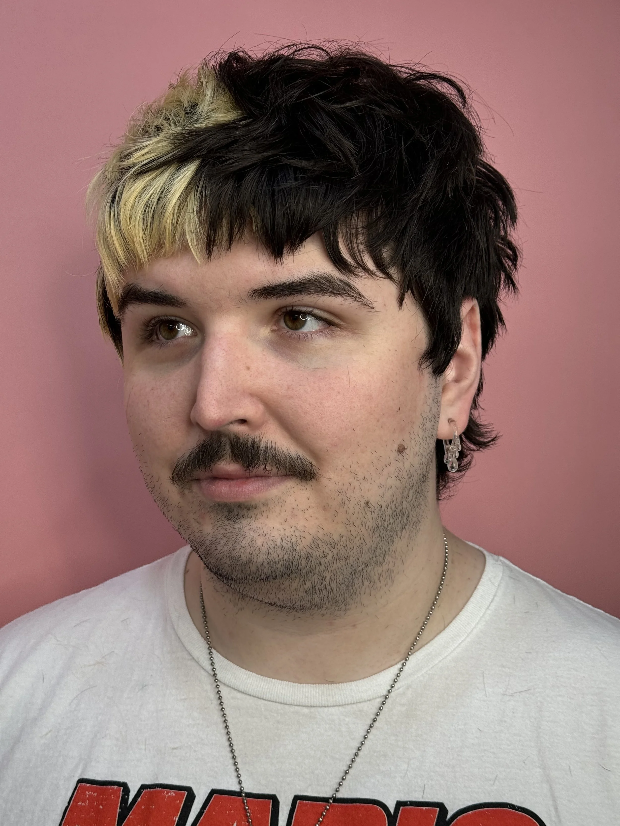 This mullet haircut also has a blonde color block to make the texture and dimension of this haircut pop! By using precision and razor Syd brought this client's vision to life mama!
