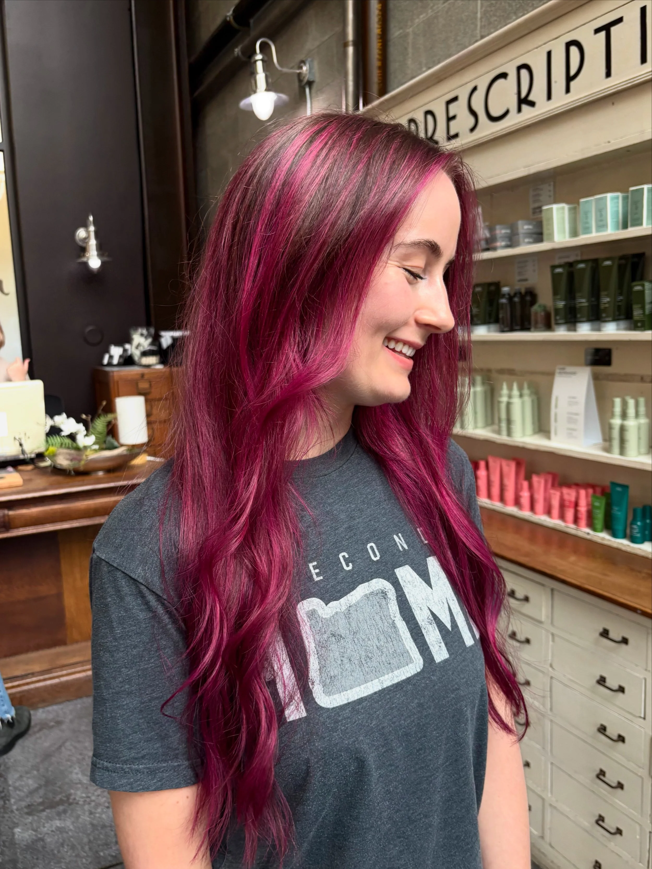 This vivid hair color was done by Charlie at Lady Neptune salon in the University District. The client looks so gorgeous and is SO happy with the final result.