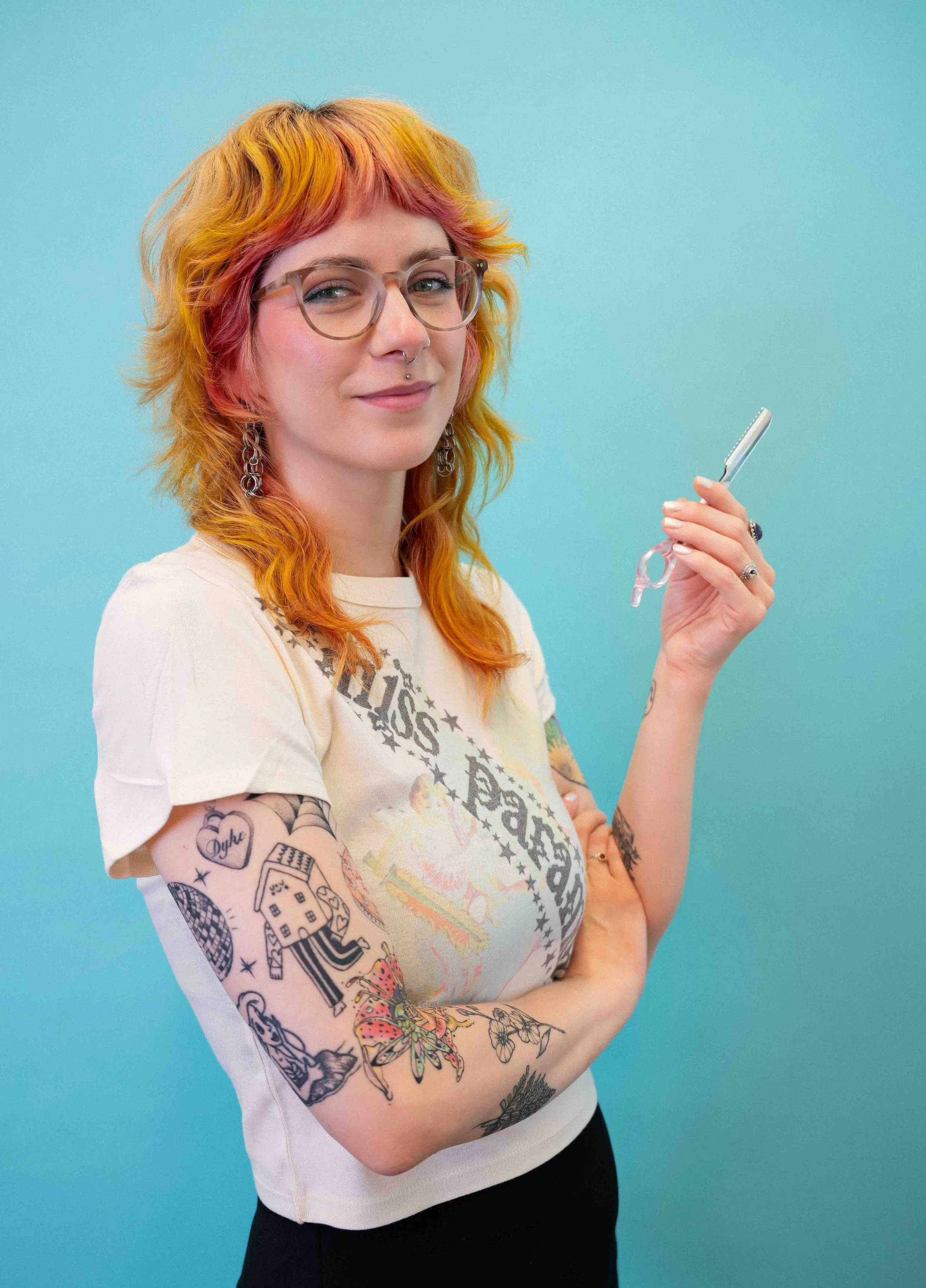 Syd (they/them) is a hairstylist at Lady Neptune that just moved to Seattle from Texas. They bring their Libra charm and wit to all of their hair appointments and specialize in precision haircutting, high-impact and low maintenance color and vivids