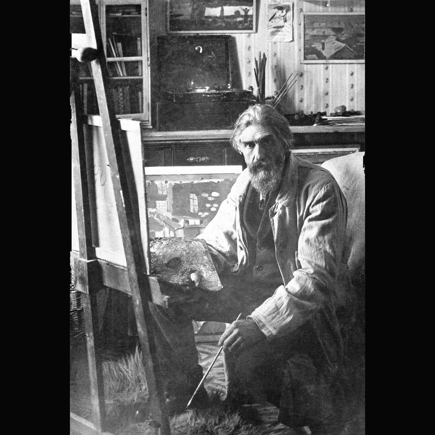 Torres-García painting in his studio, Barcelona. c. 1916.