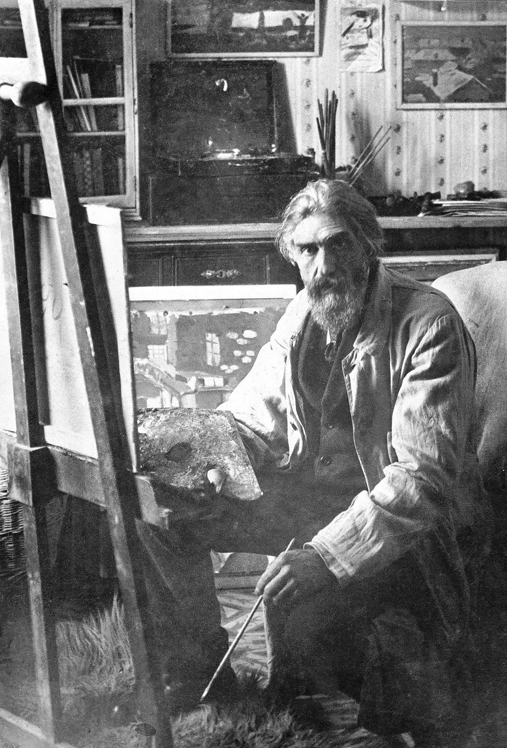 Joaquín Torres-García painting in his studio, Barcelona. c. 1918.