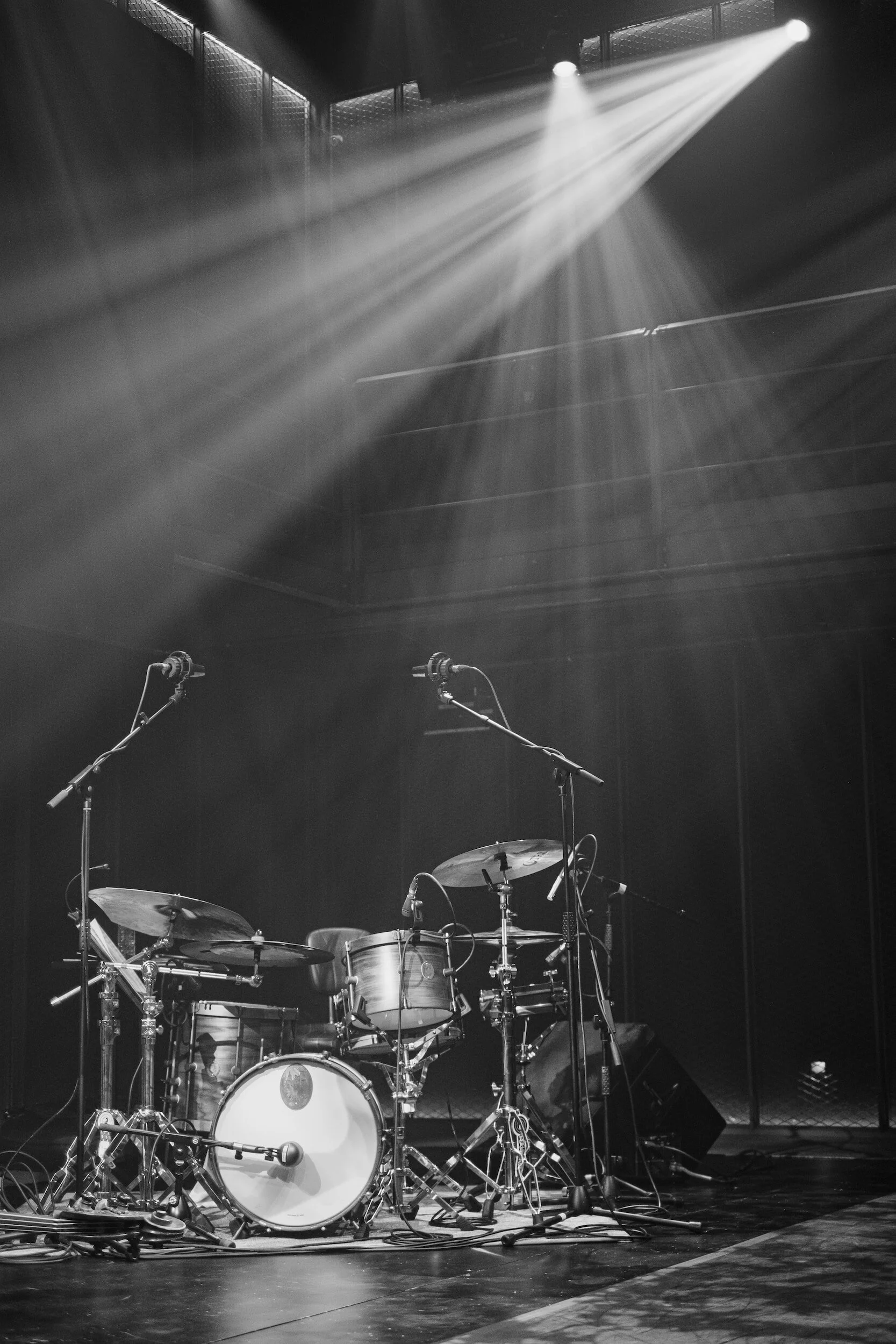A drum kit and microphone set up ahead of a performance in London.