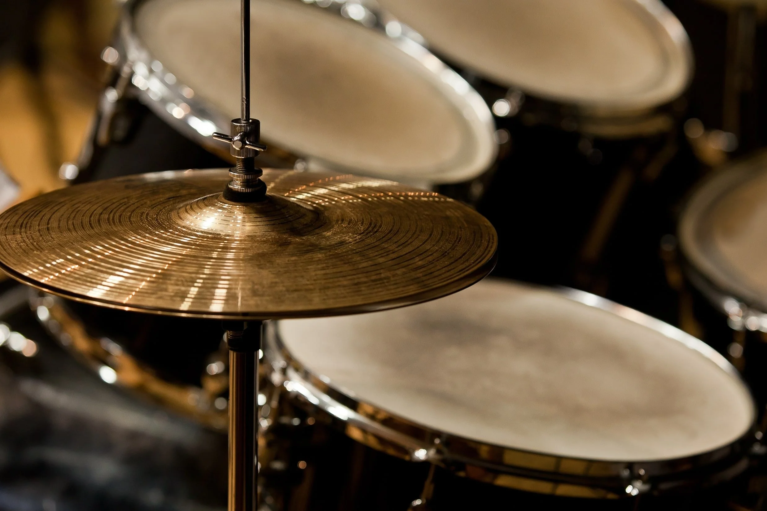 A close-up on drums and cymbals in London.