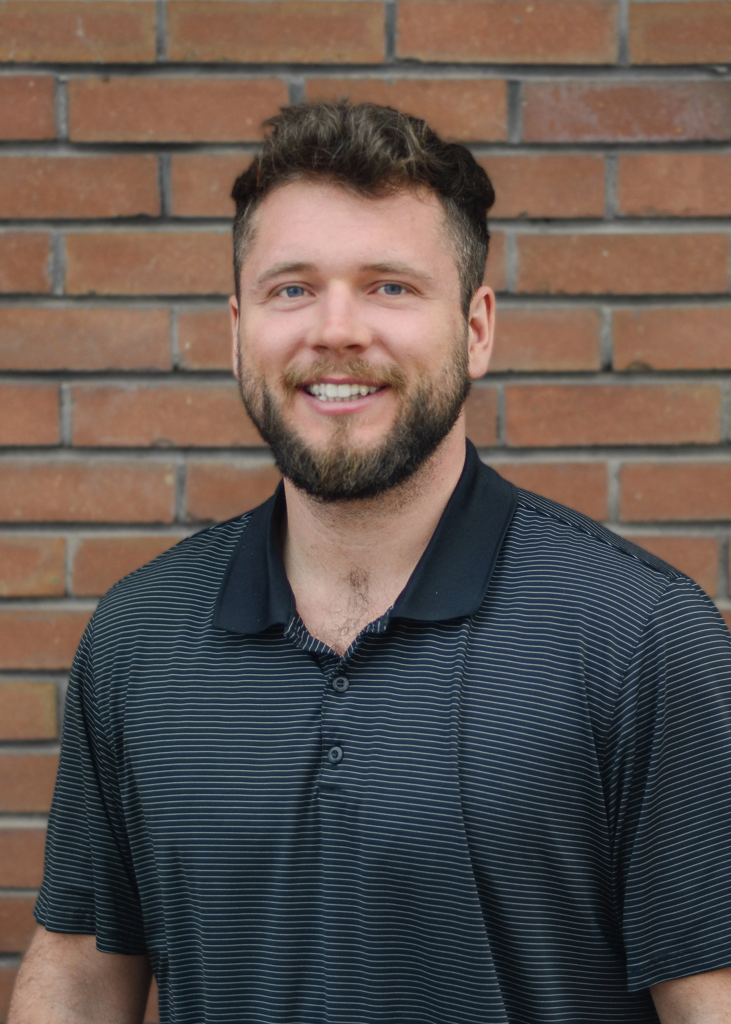 Photo of Levi Krcmar, president of Vault Roofing LLC