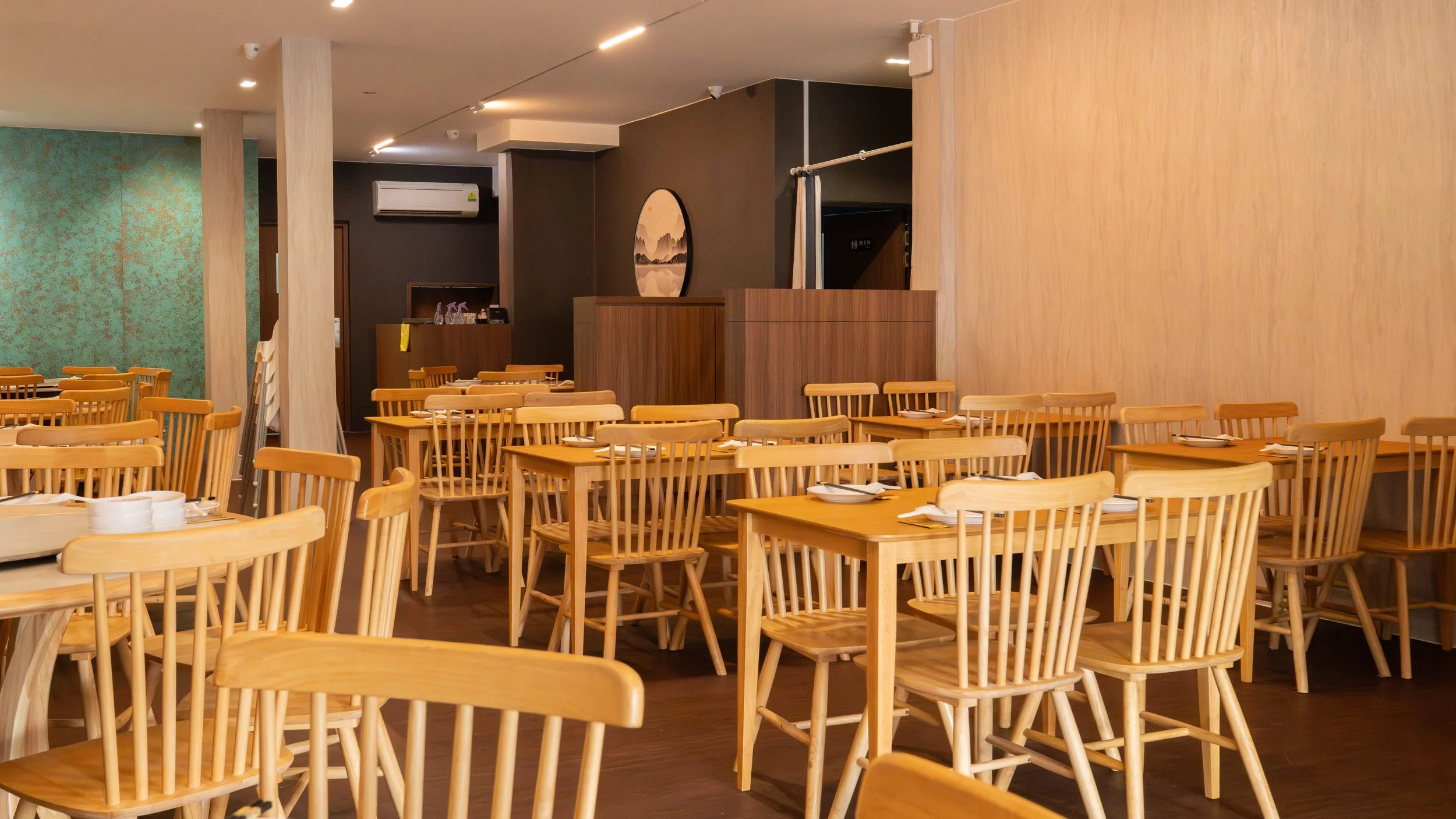 Cosy air-conditioned dining area at Orchid Live Seafood Signature, Jalan Kelulut
