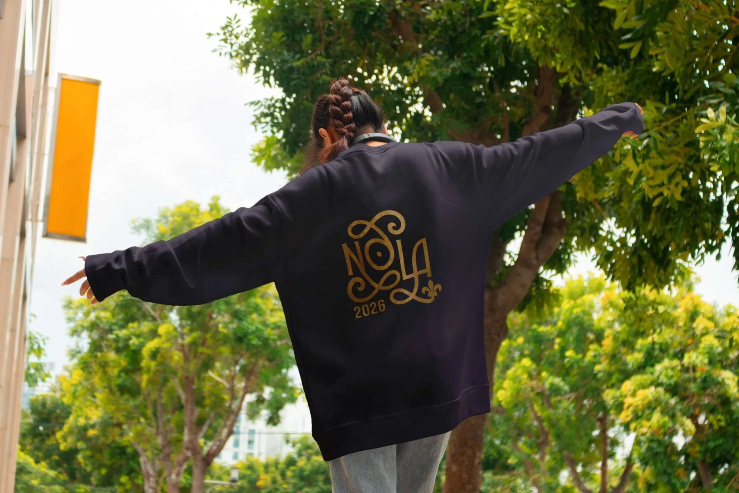 ButcherBox NOLA 2026 logo displayed on a sweatshirt on a female outsite.
