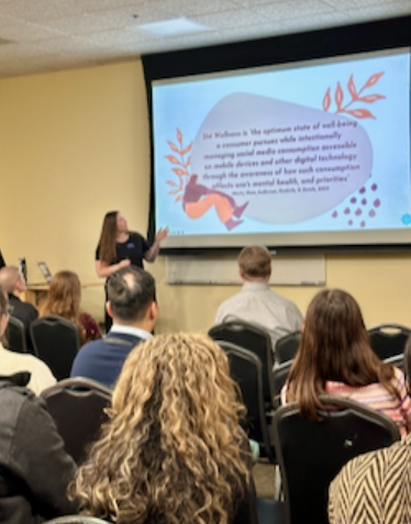 Dr. Ashley Hass presenting at the Technostress Event