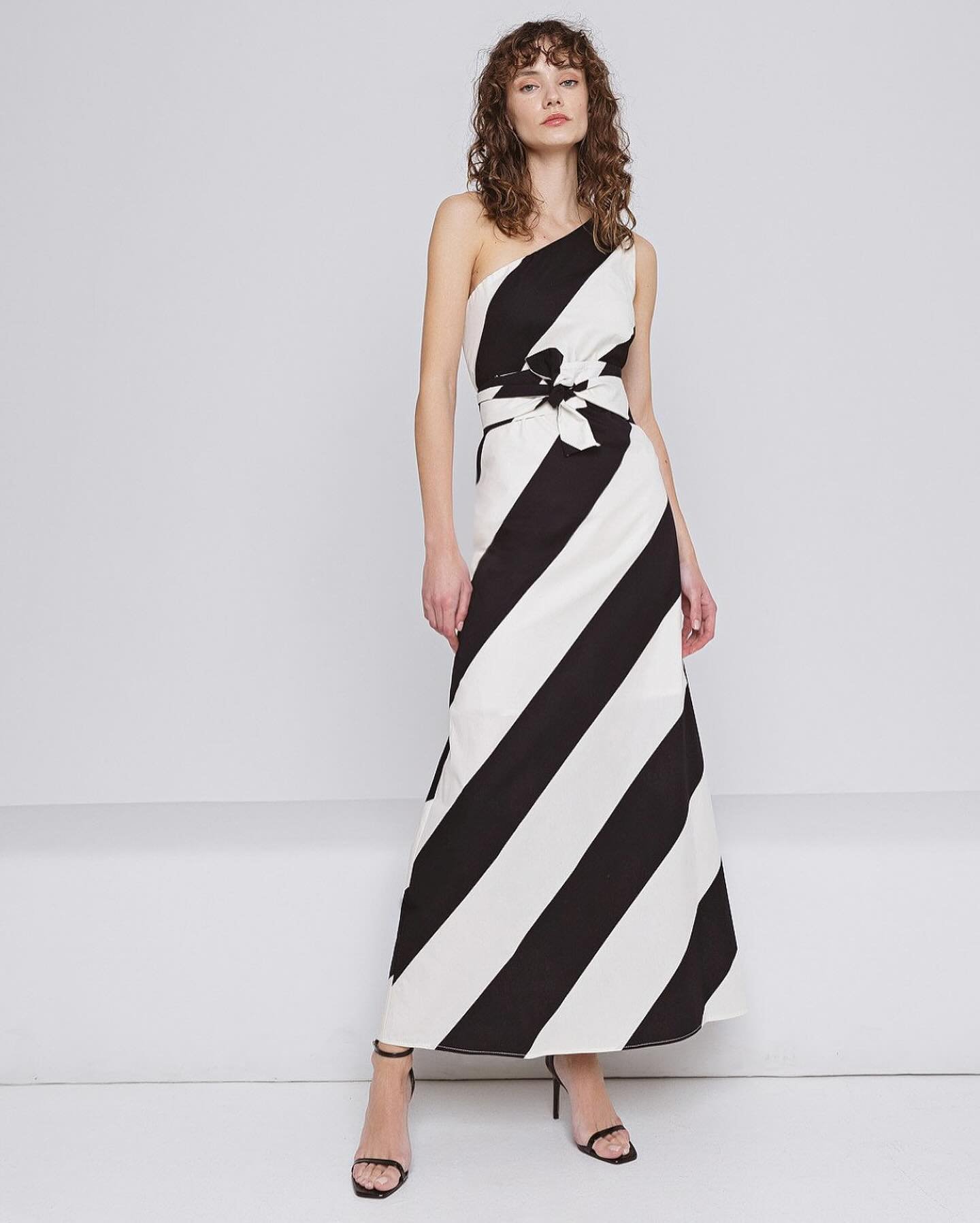 🖤🤍 New&hellip;monochrome classic striped maxi dress in a one shoulder style. Summer wedding ready 😎☀️🥂
Shop online or pop in store to see all our new arrivals, Fiona x 
#newarrivals #summervibes #occassionwear