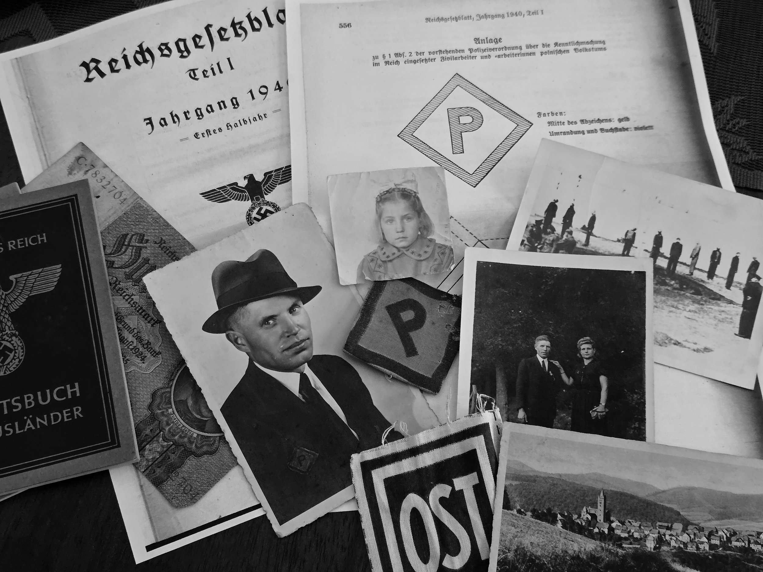 A collection of historical photographs, documents, and memorabilia related to Nazi Germany, including a portrait of a man in a suit and fedora, photos of children and soldiers, Nazi symbols, and old booklets and postcards in black and white.