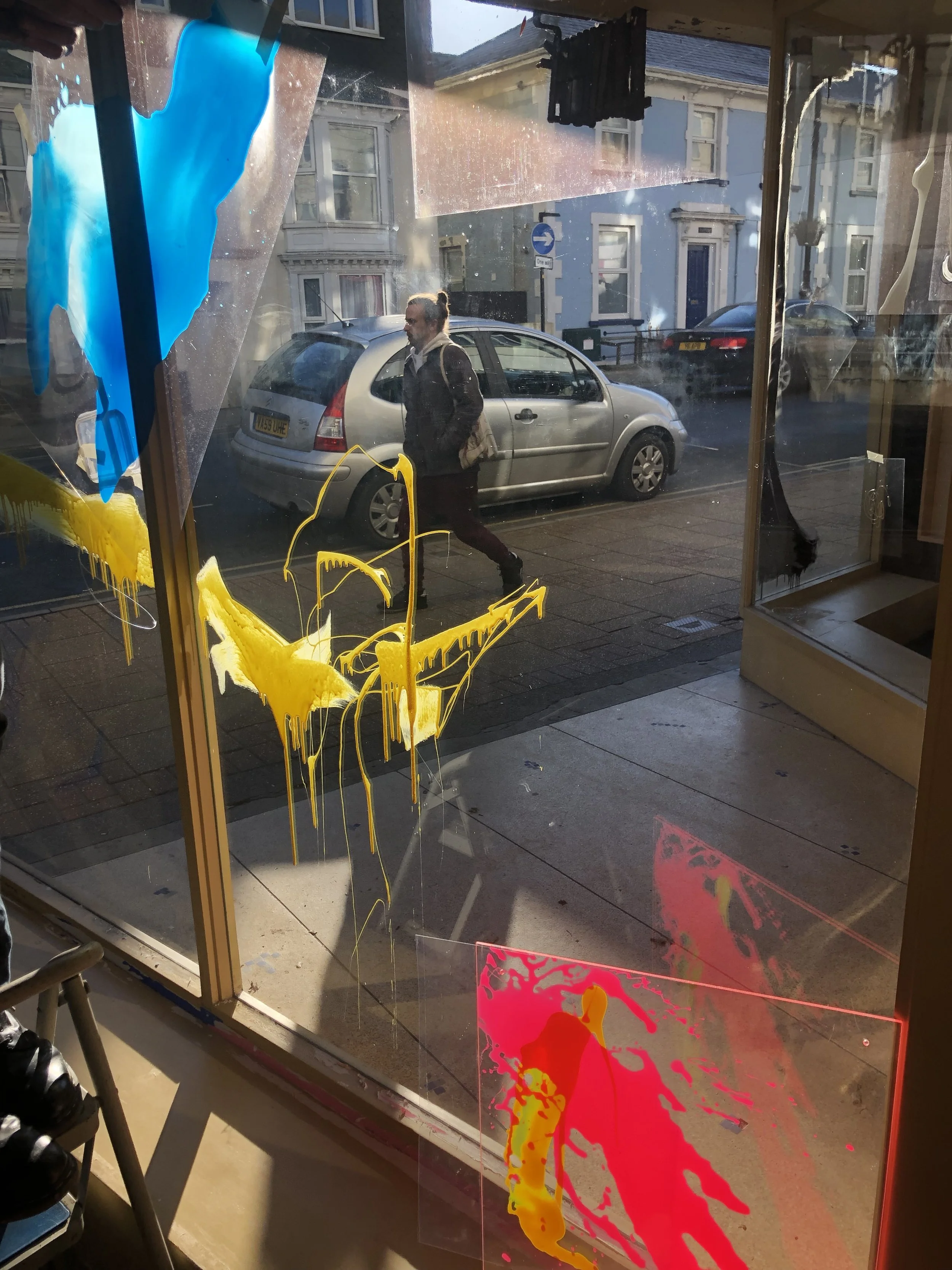 man walker bright sun splat paint.jpeg