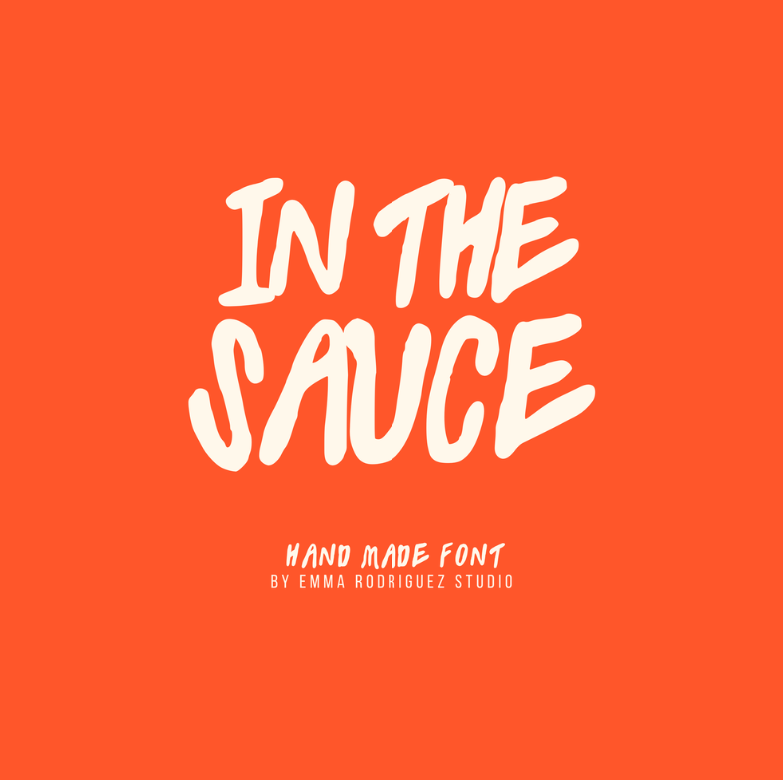 Bright orange background with white handwritten font text that reads 'In The Sauce' and smaller text below that says 'Hand Made Font by Emma Rodriguez Studio'.