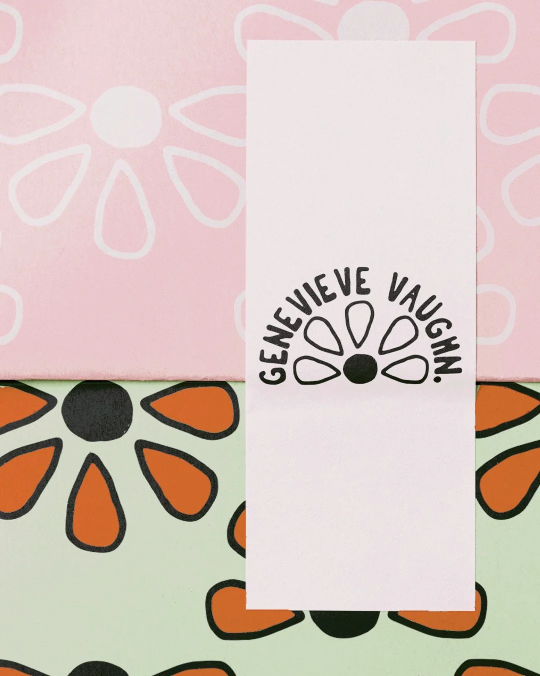 A white card with black text and a flower illustration that says 'GIVE ME VOUCHIN' placed on two colorful notebooks with floral patterns, one pink and one light green, in the background.
