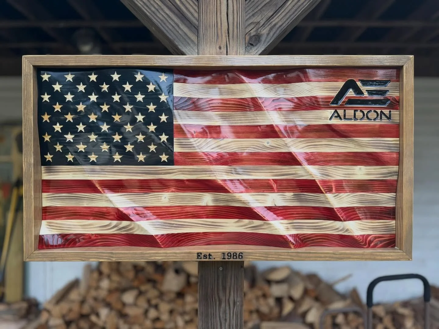 This corporate wavy flag. Which was made with wood from a renovation at Faneuil Hall was picked up last night. Came out sharp!🇺🇸🇺🇸🇺🇸 www.shoveltownflag.com