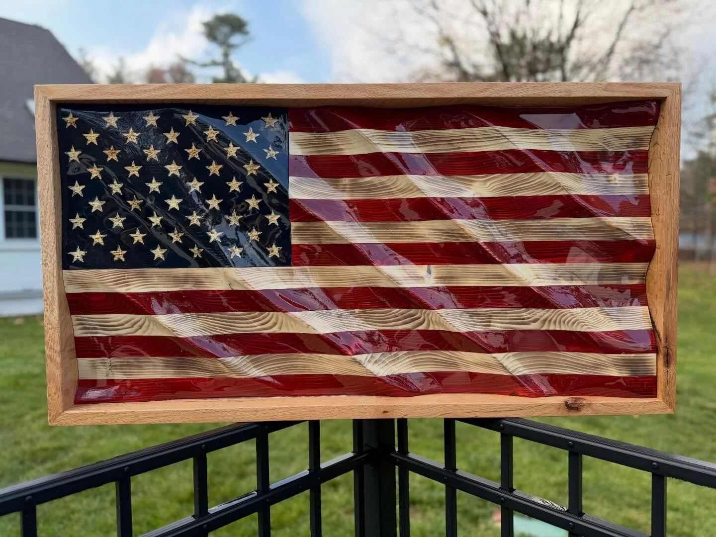 Reclaimed oak frame with epoxy on the flag itself.  Ultra high gloss, but cool!🇺🇸🇺🇸🇺🇸 www.shoveltownflag.com