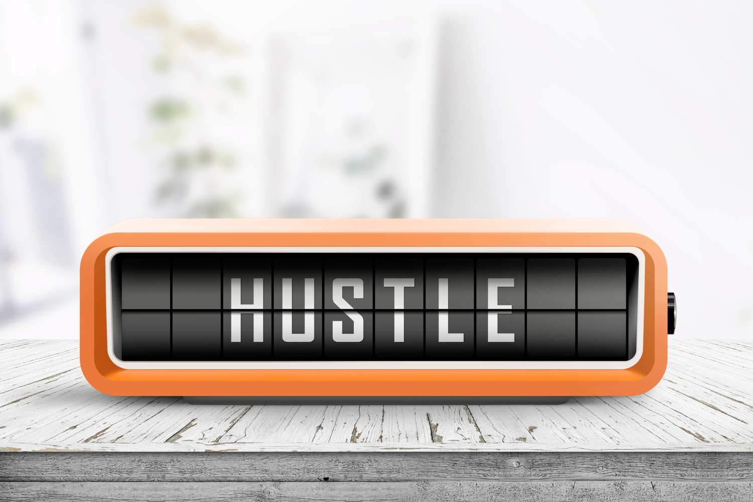 Alarm clock displaying the word hustle symbolizing hustle culture and the pressure many women feel to keep doing more.