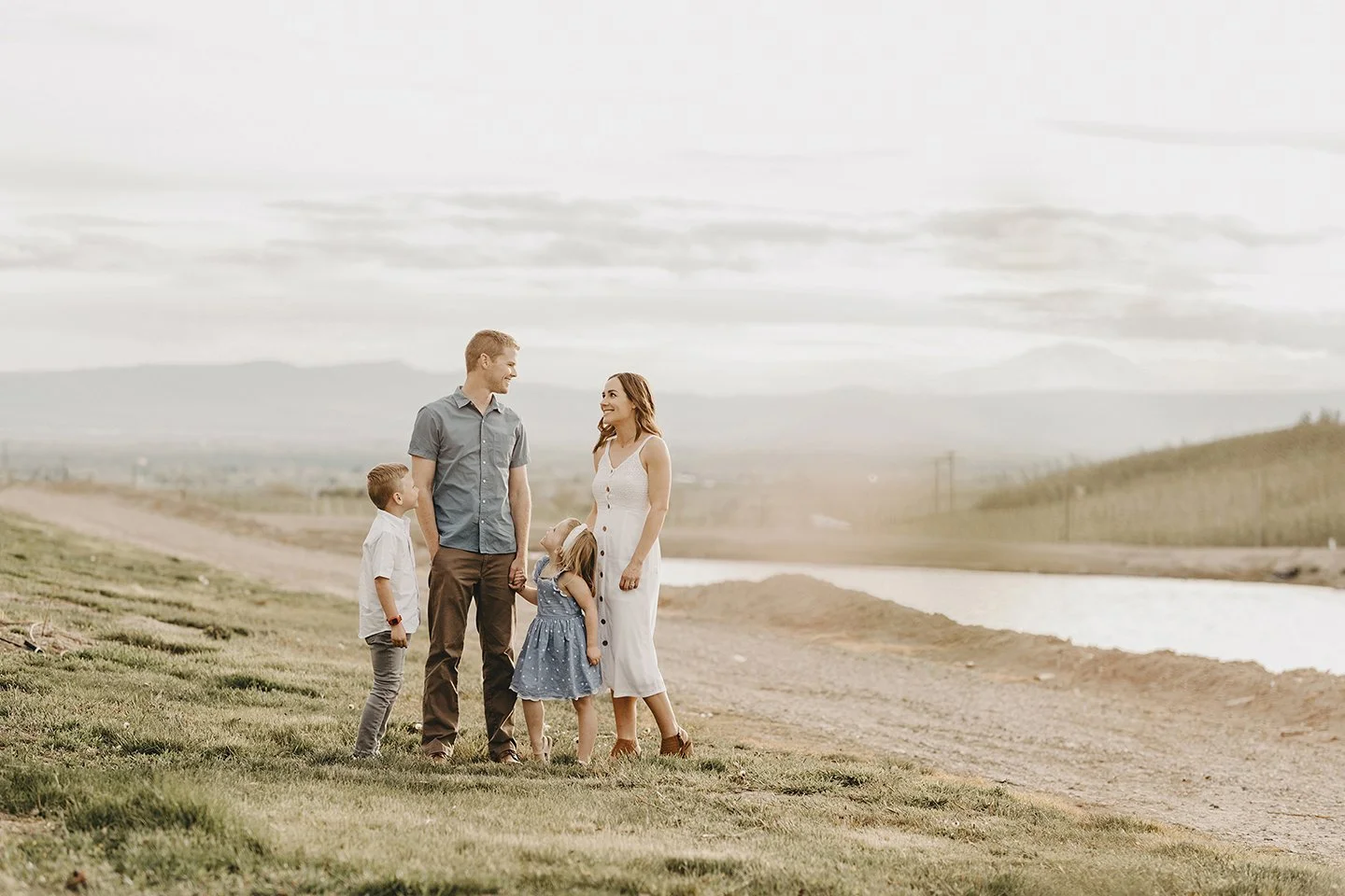 A stunning orchard view with Mount Rainier glowing behind this sweet Zillah family.