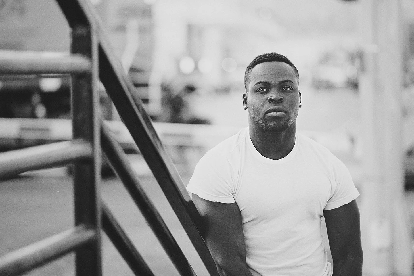 Editorial B&W senior portrait with modern urban tones in downtown Prosser.