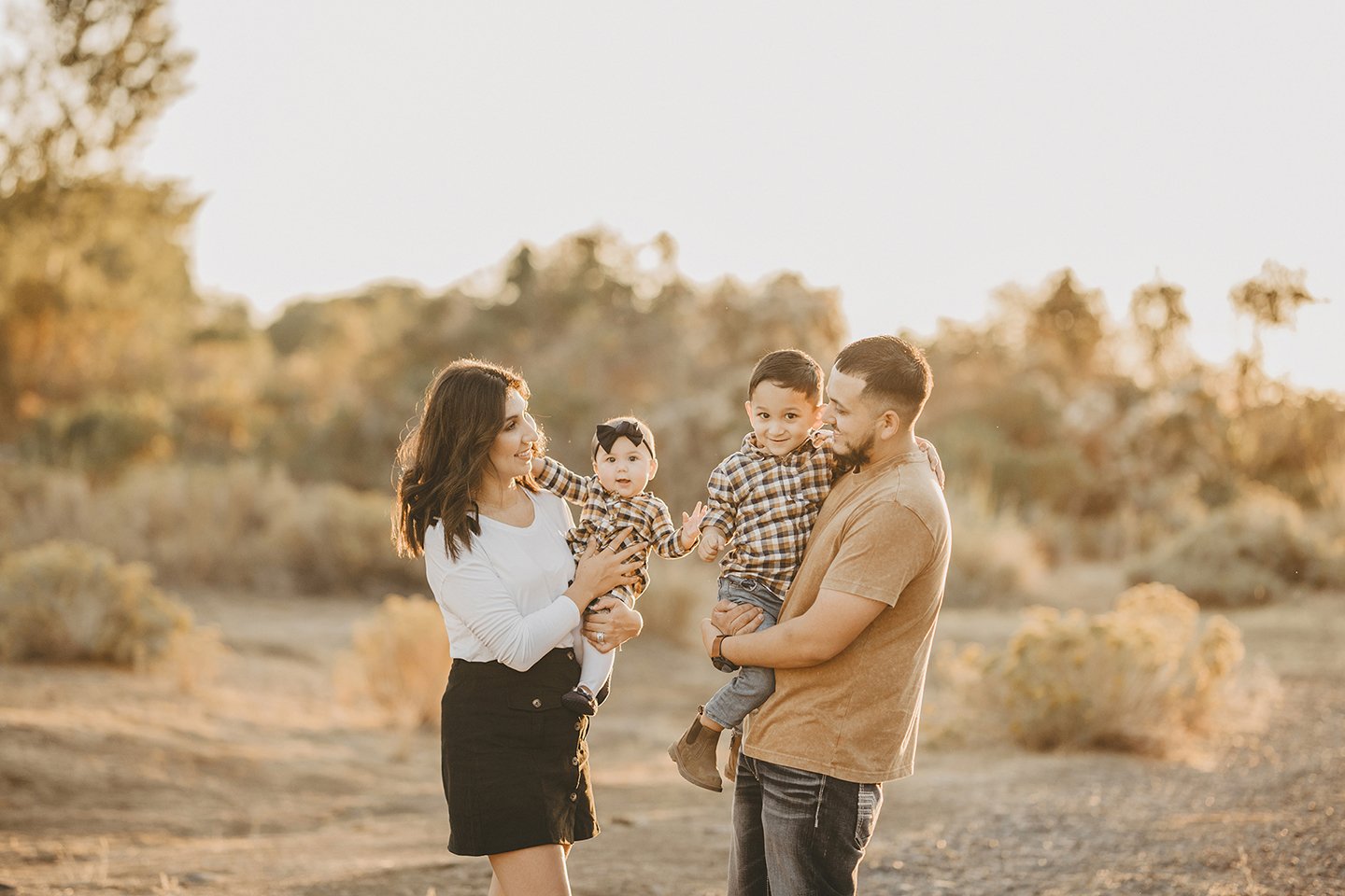 Warm golden-hour family portraits with soft dry-land tones in Toppenish, WA