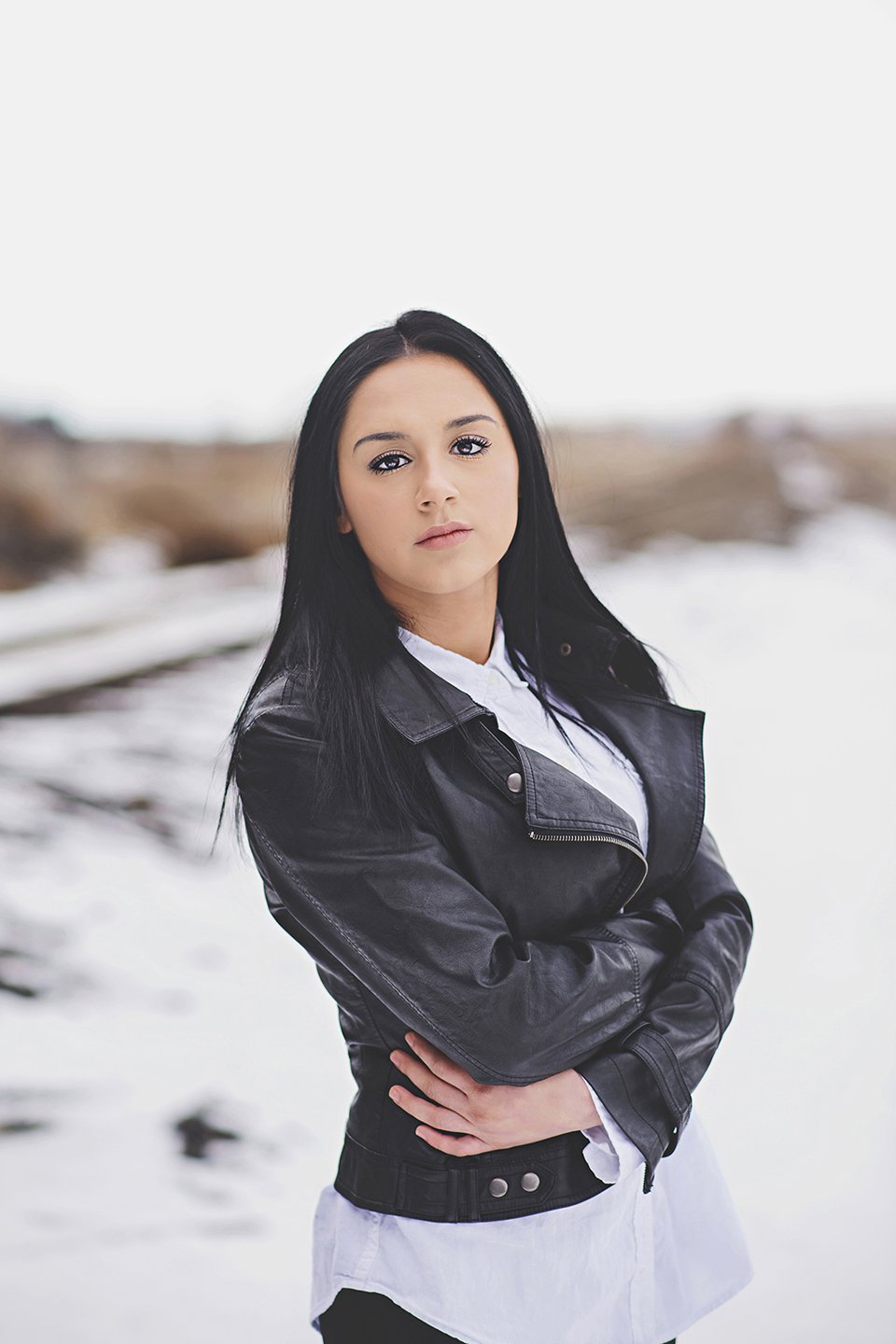 Beautiful winter portrait of Cora with soft tones, clean light, and timeless style in Grandiview, WA