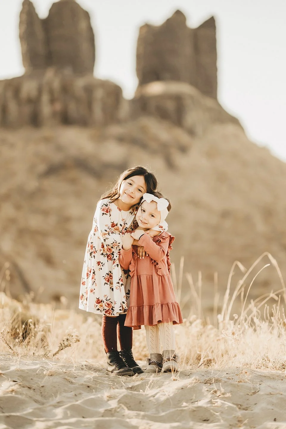 A heartfelt moment between two sisters overlooking the unique rock formations at Twin SIster's Rocks, WA