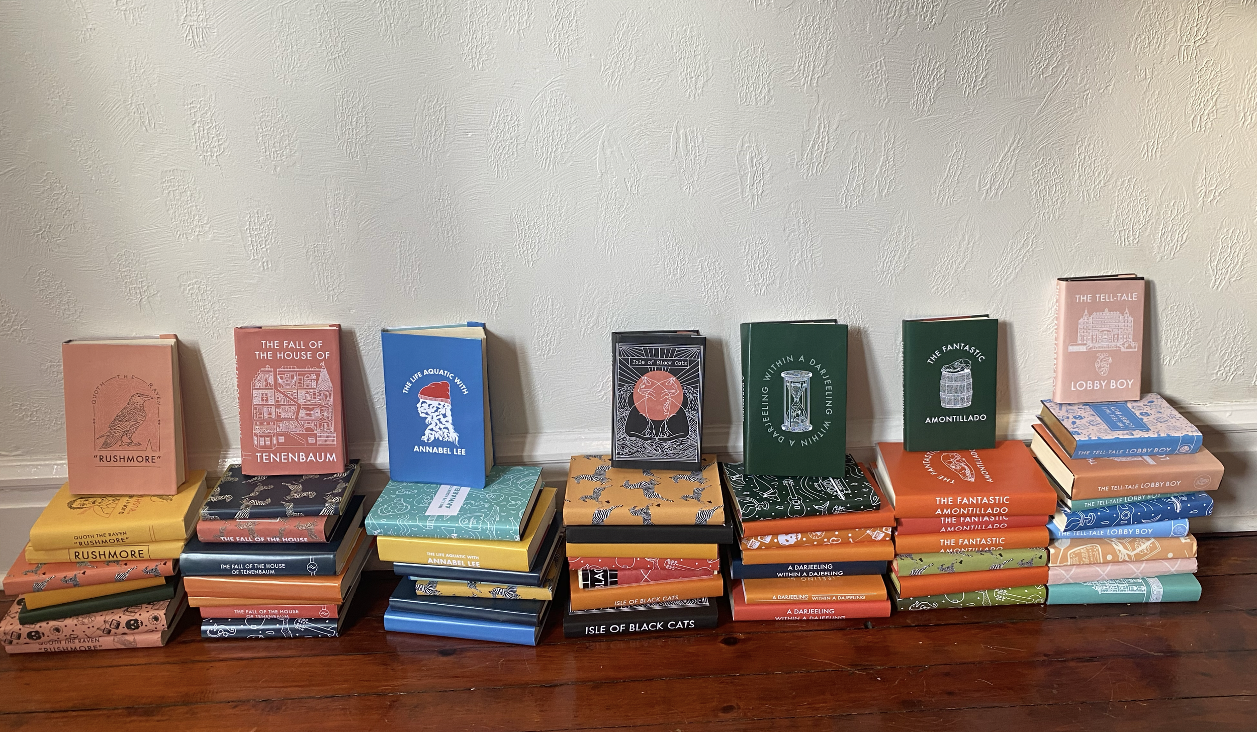 ~60 unique book cover designs -- illustrated, printed and assembled by me