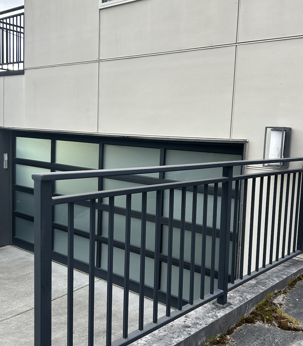 Powder-coated exterior metal railings for outdoor walkways