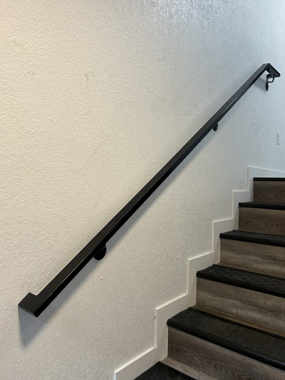 Architectural metal handrails for interior applications
