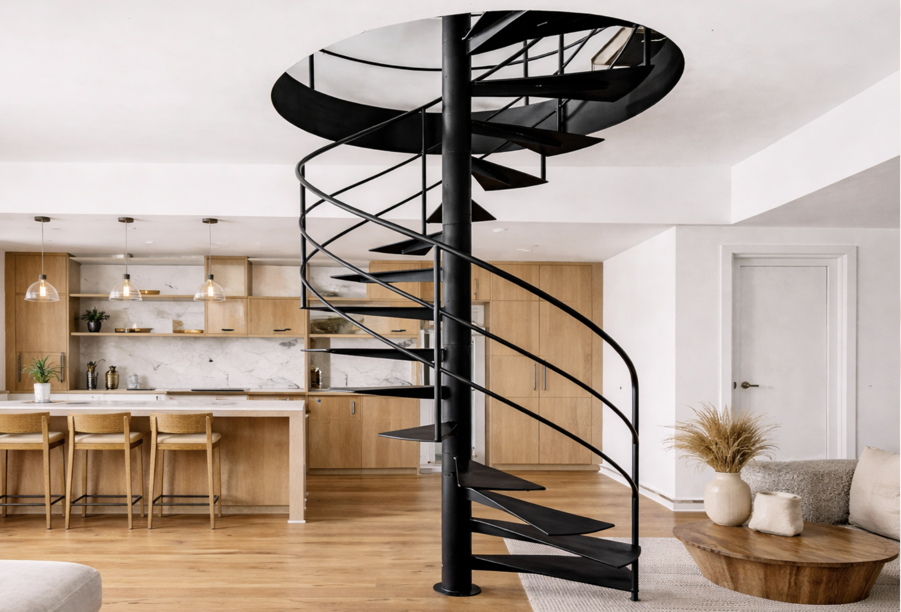 Custom spiral metal staircase with powder-coated finish