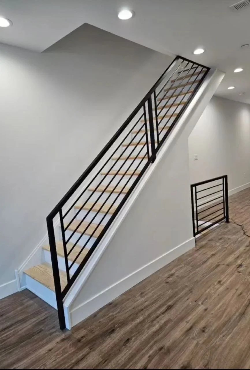 Exterior metal handrail for entry steps with weather-resistant coating