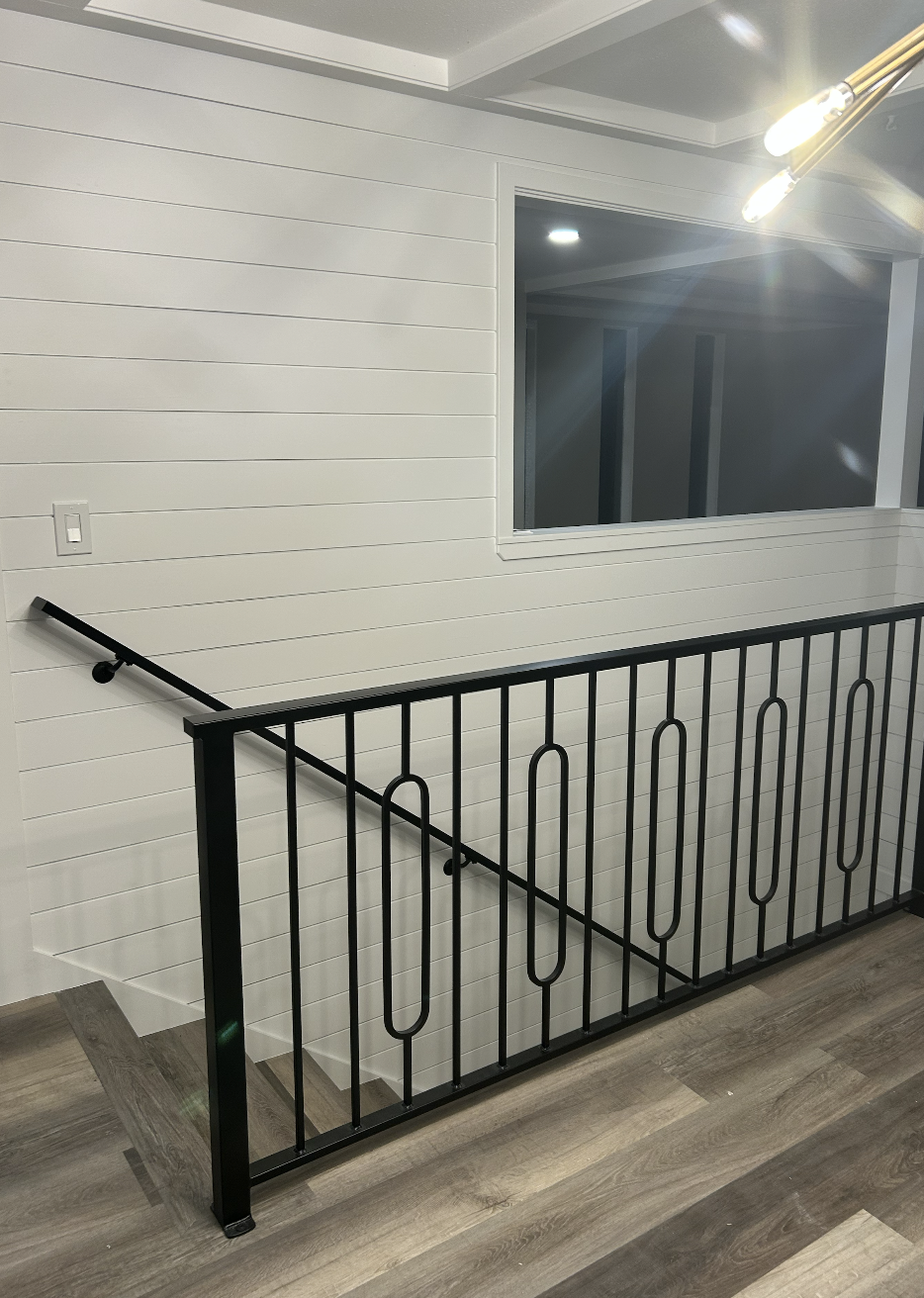 Interior metal railing system custom fabricated and powder coated in-house