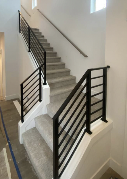 Metal handrails for interior staircases with durable coating