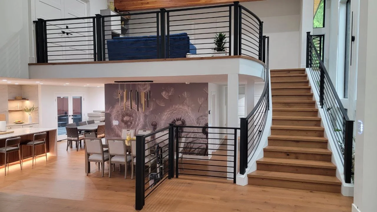 Custom interior metal railings with powder-coated finish for staircase and upper level