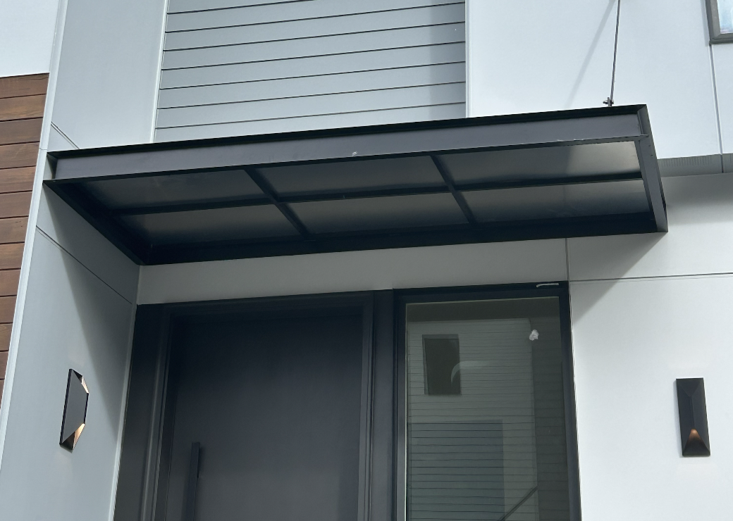Exterior metal canopy designed for weather protection and durability