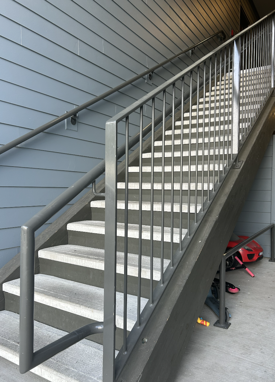 Custom metal handrails fabricated and powder coated in-house