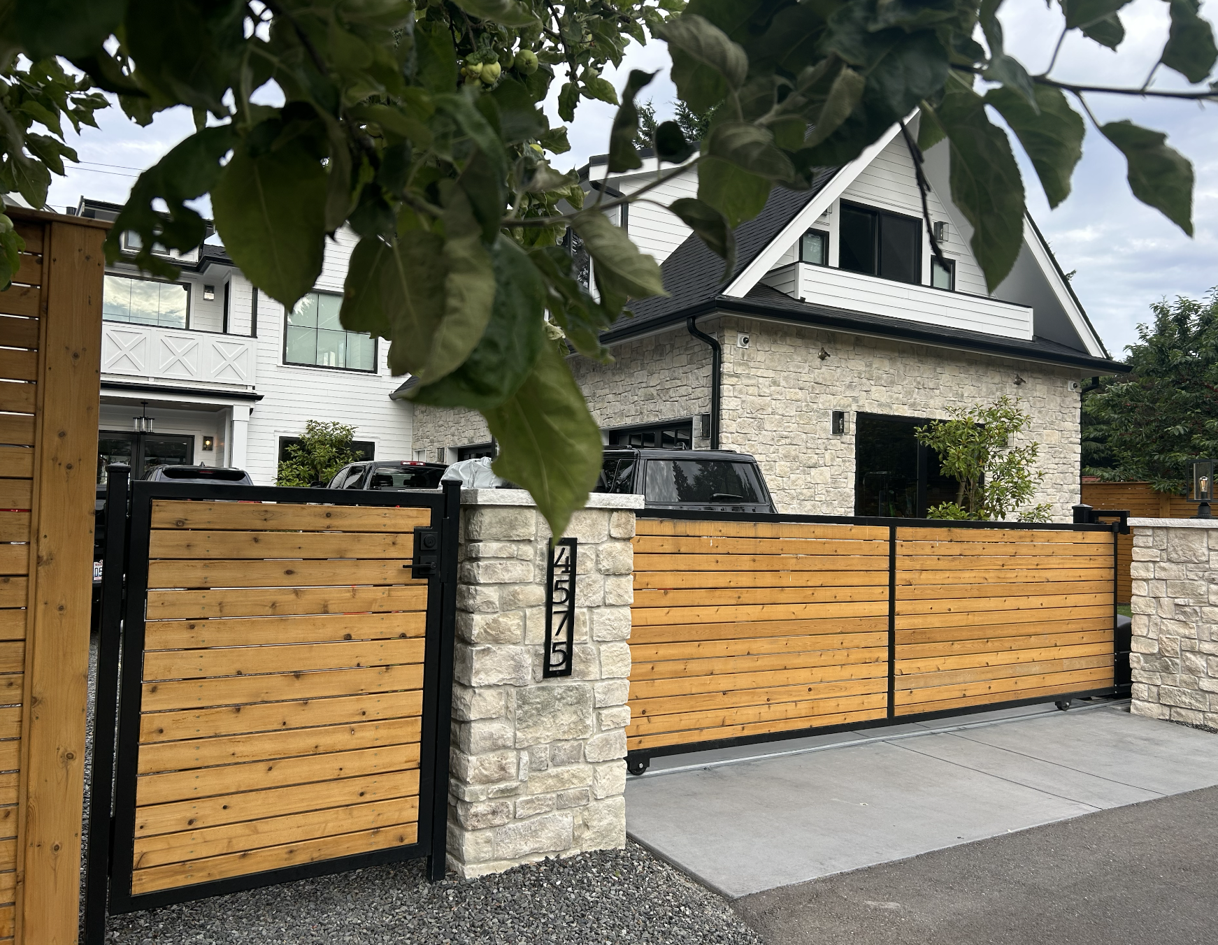 Custom metal gate fabricated from powder-coated steel