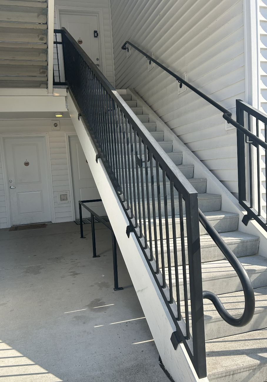 Modern metal handrail system with clean powder-coated design