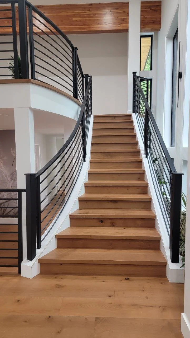 Custom metal handrail for interior staircase with powder-coated finish