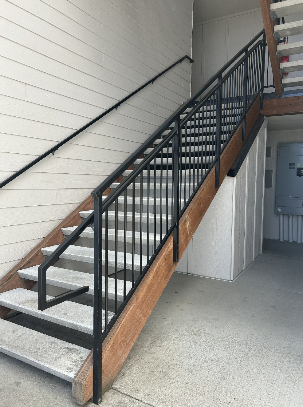 Powder-coated metal handrails with smooth durable finish